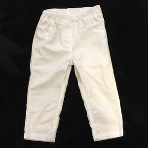 Girls white corduroy pants.